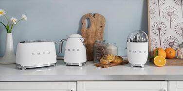 Електрична соковижималка для цитрусових Smeg CJF01PGEU, ручний прес, універсальний конус, 70 Вт, матовий білий