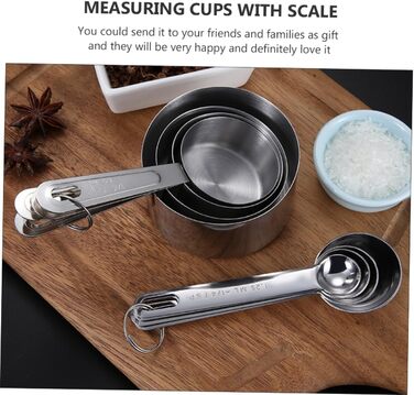 2 Measuring spoons, baking, kitchen machine, cookware, kitchenware, cookrings, saucer, kitchen scales, measuring cup, measuring spoons (scaled, graduated), stainless steel, silver.