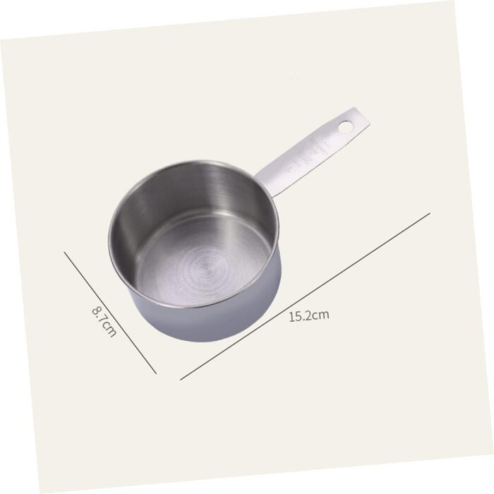 2 Measuring spoons, baking, kitchen machine, cookware, kitchenware, cookrings, saucer, kitchen scales, measuring cup, measuring spoons (scaled, graduated), stainless steel, silver.