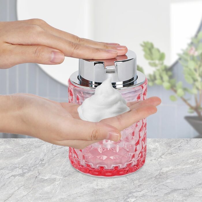 Pink bathroom accessory set made of glass, including a toothbrush holder, soap dispenser, and cup, a foaming soap dispenser, and a toothbrush holder, 3 pink bathroom cups for brush, toothpaste.