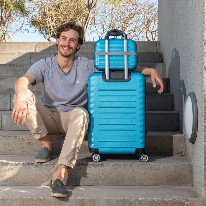 Набір валіз NEWTECK 4 шт. (75см, 63см, 53см) + косметичка, ABS, жорсткий, синій