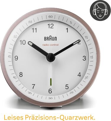 Classic analog radio alarm clock by Braun for the Central European Time zone (CET/GMT+1) with snooze function, lighting, quiet movement, crescendo alarm in white and rose, model BC07PW-DCF