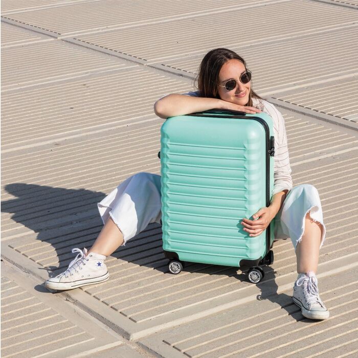 Набір валіз NUMADA 3 шт. (кабіна, середня) з культовою сумкою, м'ятно-зелений, ABS, міцний, з коліщатами та замком