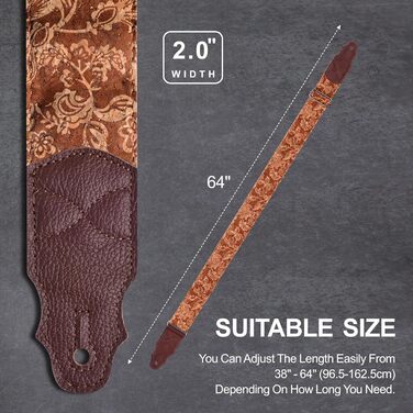 Гітарний ремінь з натуральної шкіри (2 дюйми) для акустичної, бас та електрогітари. Регулюється від 96 до 163 см. М'яка обробка деревини, коричнева квітка.