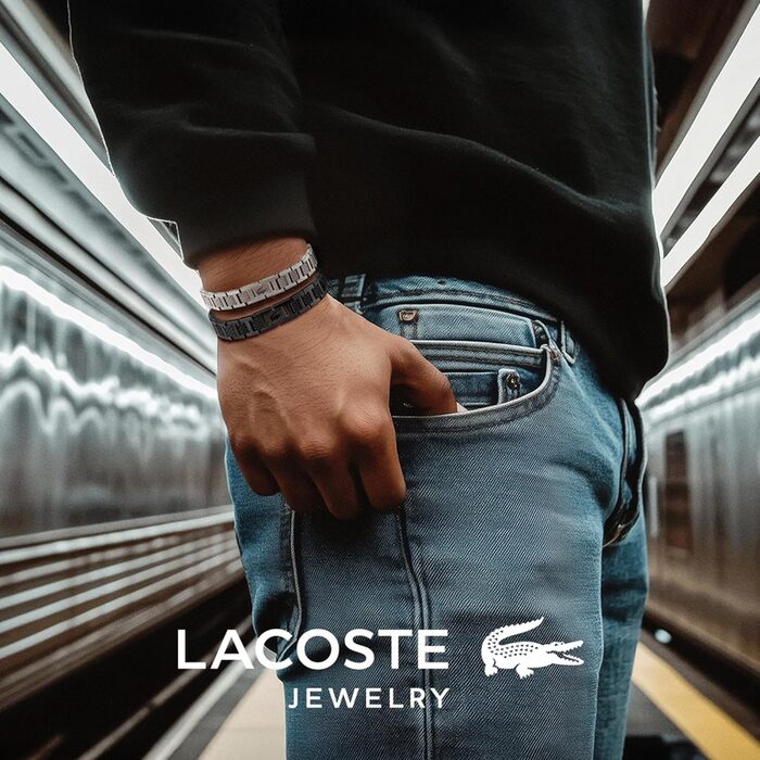 Браслет Lacoste MetroPole з застібкою-кнебелем. З візерунком petit piqué. Срібний, для чоловіків та жінок