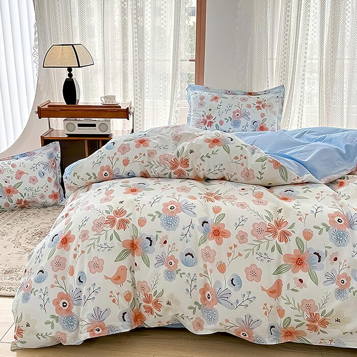 Блискуча постільна білизна Bunt Blumen з бавовни 100x135 см. Комплект для дитячого ліжка: простирадло, ковдра та подушка з квітковим малюнком.