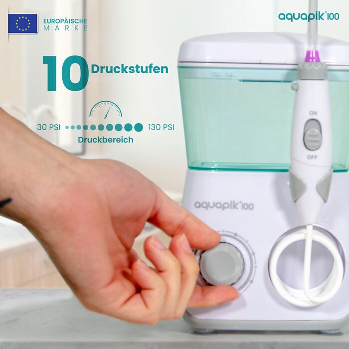 Іригатор для порожнини рота Munddusche Aquapik 100 – рекомендований стоматологами пристрій для видалення нальоту з 8 насадками, 10 рівнями тиску, баком 600 мл, поворотним 360° наконечником, шлангом 100 см, ідеальний для імплантів та ортодонтії, білий