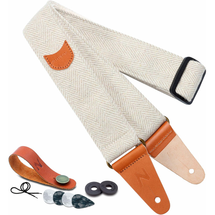 Гітарний ремінь Nefelibata: м'який, з кашеміру, повноекошкіряний. Для бас-, електро- та акустичної гітари. З кнопкою, замками та медіатором. Кремовий та білий твід