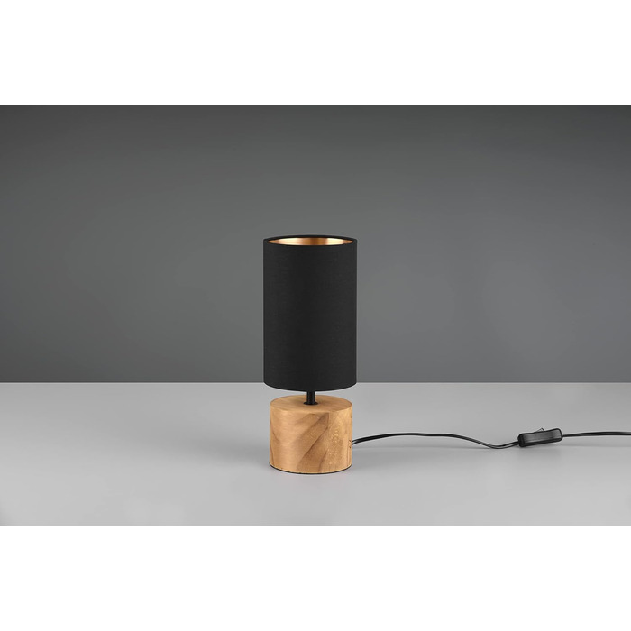 Настільна лампа Reality Leuchten Woody R50181080: чорний матовий метал, дерев'яний цоколь, абажур з тканини золотого кольору, без лампочки E27. Діаметр абажура 12 см