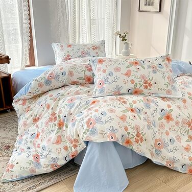 Блискуча постільна білизна Bunt Blumen з бавовни 100x135 см. Комплект для дитячого ліжка: простирадло, ковдра та подушка з квітковим малюнком.