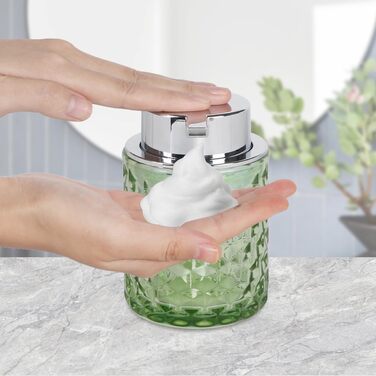 Pink bathroom accessory set made of glass, including a toothbrush holder, soap dispenser, and cup, a foaming soap dispenser, and a toothbrush holder, 3 pink bathroom cups for brush and toothpaste (green and silver).