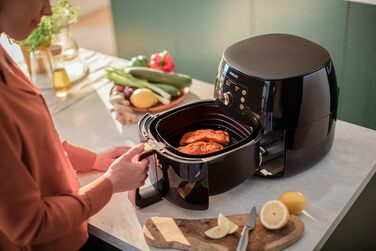 Philips Airfryer XXL with Rapid Air Technology - Hot Air Fryer with 7.3L Capacity, 90% Less Fat, Smart Sensing for Perfect Results, QuickClean, Recipe App, Black/Copper (HD9867/90)