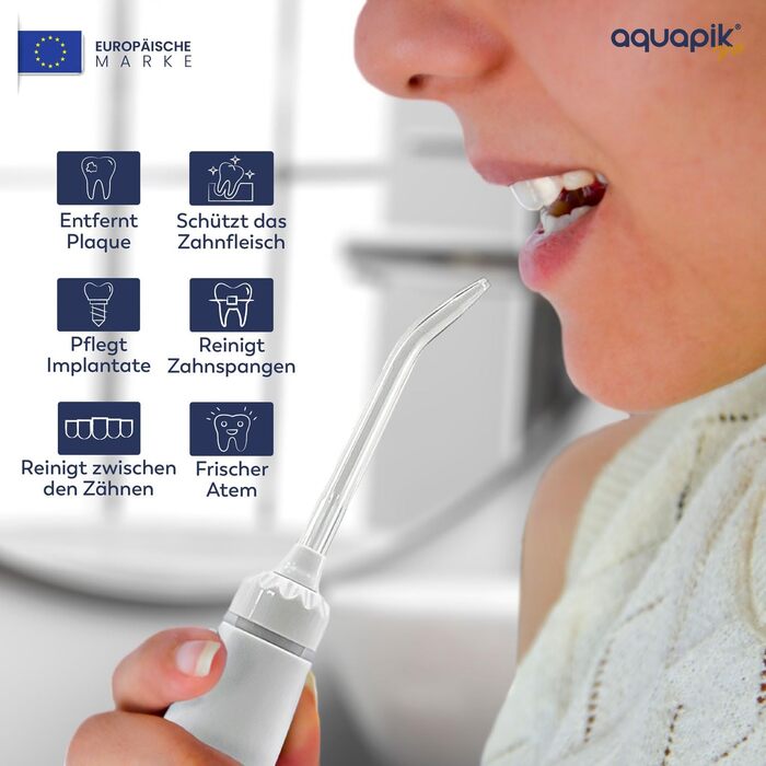 Іригатор для порожнини рота Munddusche PRO | Aquapik® | Професійне очищення зубів, видаляє наліт, рекомендовано стоматологами, для імплантів та брекетів | 8 насадок, 10 рівнів тиску, 600 мл (Білий)