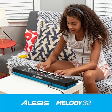Alesis Melody 54 - Портативна клавіатура з 54 клавішами, вбудованими динаміками, 300 звуками, 300 ритмами, 40 демо-піснями, навчальними інструментами, мікрофоном та підставкою для нот (32 клавіші)