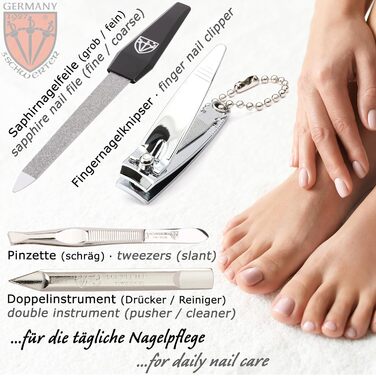 Набір манікюру DREI SCHWERTER 'Ravenna' 6 предметів | Комплект догляду за нігтями в екошкіряному футлярі з імітацією зміїної шкіри. В комплекті: ножиці для нігтів, щипчики для кутикули, кусачки для нігтів, напільник із сапфіру, засіб для очищення нігтів, 