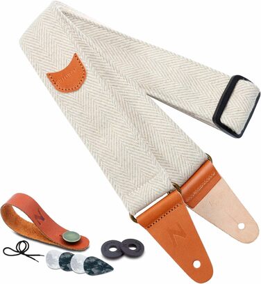 Гітарний ремінь Nefelibata: м'який, з кашеміру, повноекошкіряний. Для бас-, електро- та акустичної гітари. З кнопкою, замками та медіатором. Кремовий та білий твід