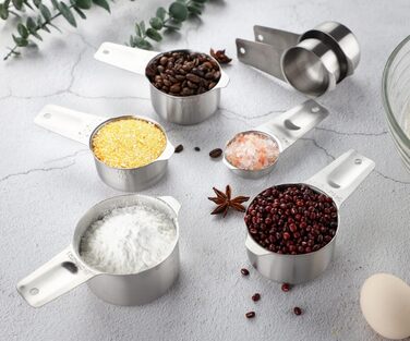 Measuring Cup and Spoon Set Stainless Steel Measuring Cup & Spoon Set includes 7 stainless steel metal measuring cups, 6 measuring spoons, and 5 mini measuring spoons for dry and liquid ingredients.