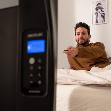 Cecotec ReadyWarm 2000 Thermal Black Flat Radiator with Remote Control. 10 heating ribs and 1500W, LCD display, programmable timer, temperature selection, 15 m² range and maximum safety with 10 elements in black.