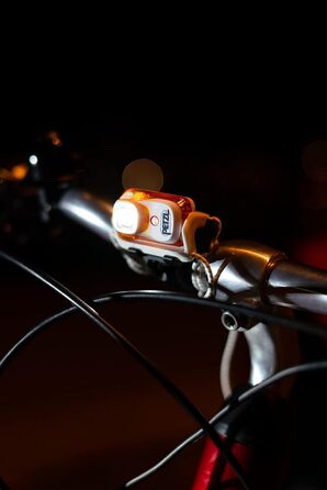 Ліхтар налобний Petzl Bindi Esmeralda, компактний, USB-зарядка