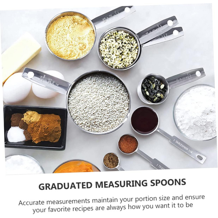 2 Measuring spoons, baking, kitchen machine, cookware, kitchenware, cookrings, saucer, kitchen scales, measuring cup, measuring spoons (scaled, graduated), stainless steel, silver.