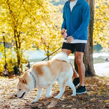 Висувна поводок для собак, 5 м, для маленьких та середніх собак до 25 кг, антизаплутування, міцний нейлоновий поводок (рожево-білі крапки)