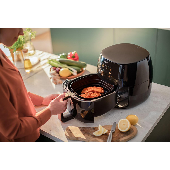 Philips Airfryer XXL with Rapid Air Technology - Hot Air Fryer with 7.3L Capacity, 90% Less Fat, Smart Sensing for Perfect Results, QuickClean, Recipe App, Black/Copper (HD9867/90)